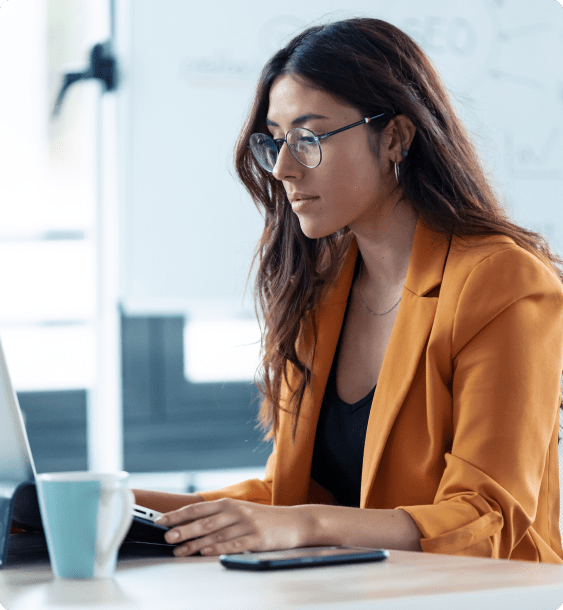 shot-business-young-woman-working-with-laptop-office-min